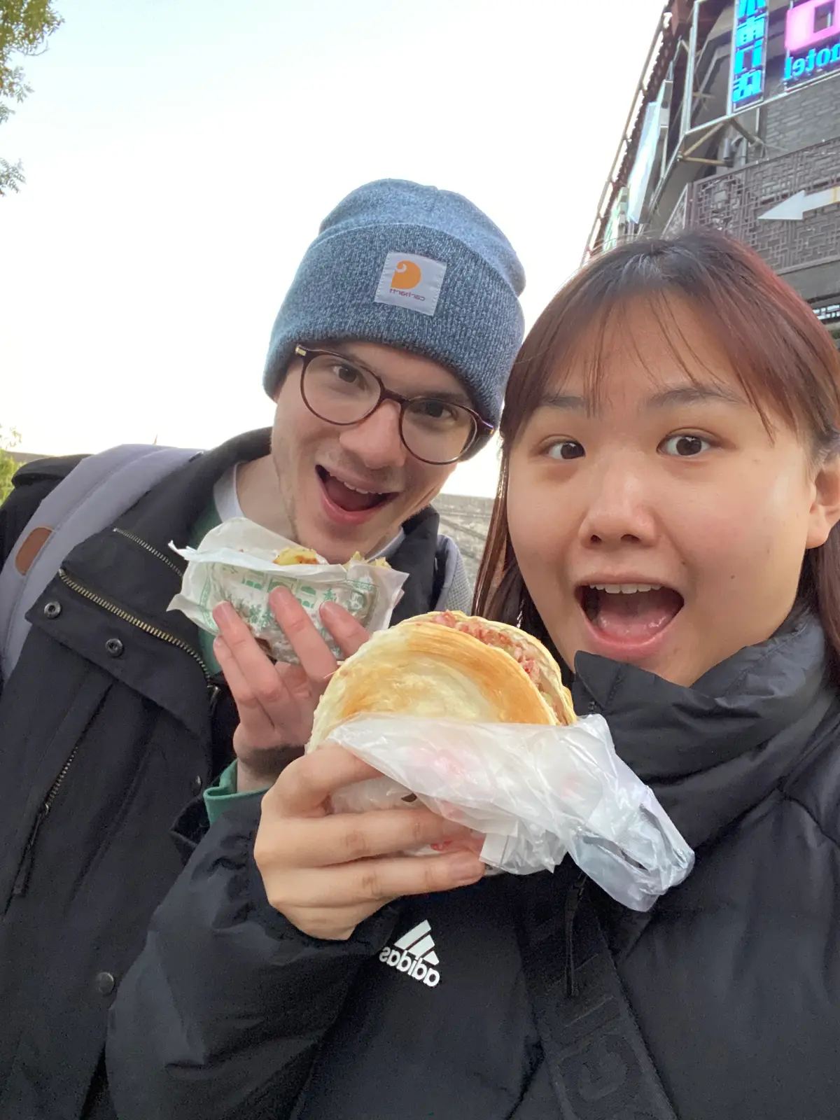 Angela and Sean enjoying street food